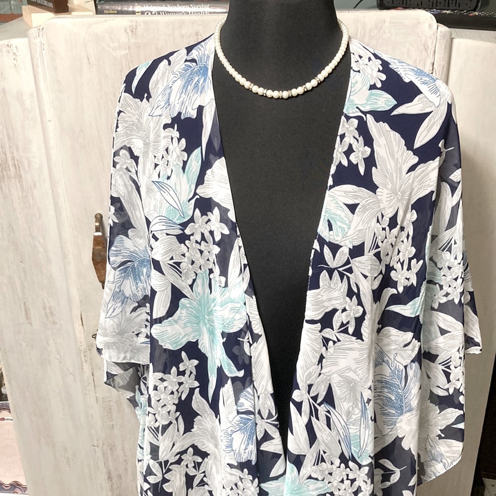 It can be worn as a light jacket to cover shoulders or worn off the shoulder.